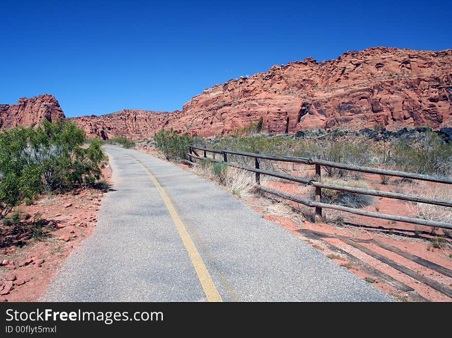 Road through a red canyon in the Southwestern U.S. Road through a red canyon in the Southwestern U.S.