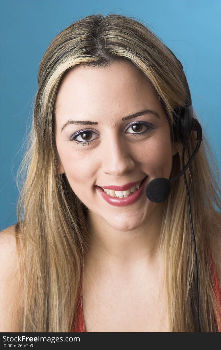 Portrait of receptionist with headset over blue drop