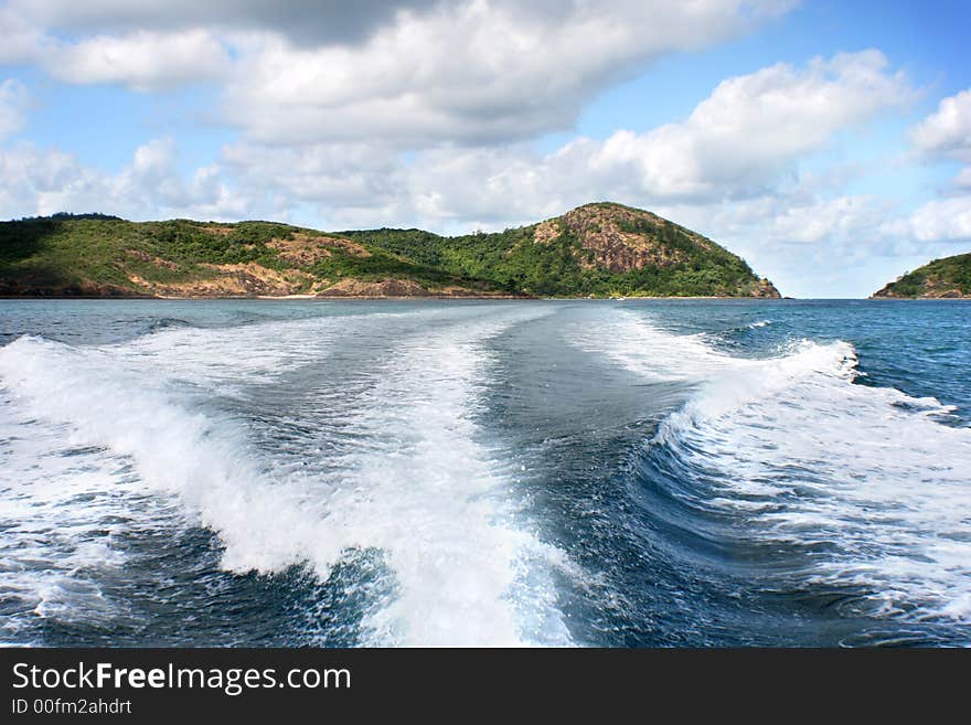 Beautiful Island view from the back of a speed boat. Beautiful Island view from the back of a speed boat