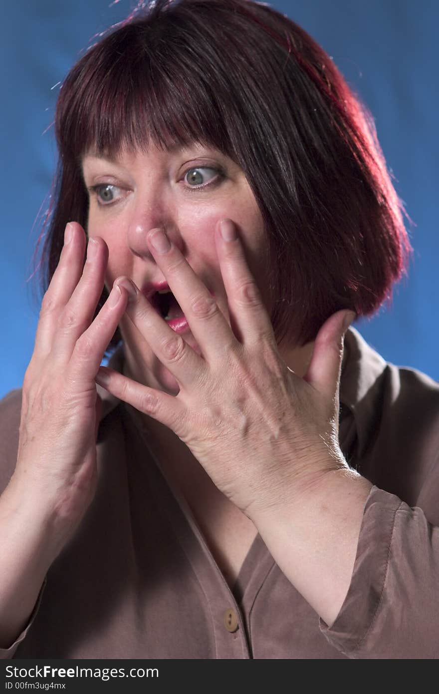 Startled woman with surprised expression. Startled woman with surprised expression