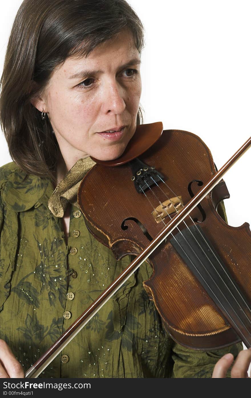 Mid-age woman playing violon over white background