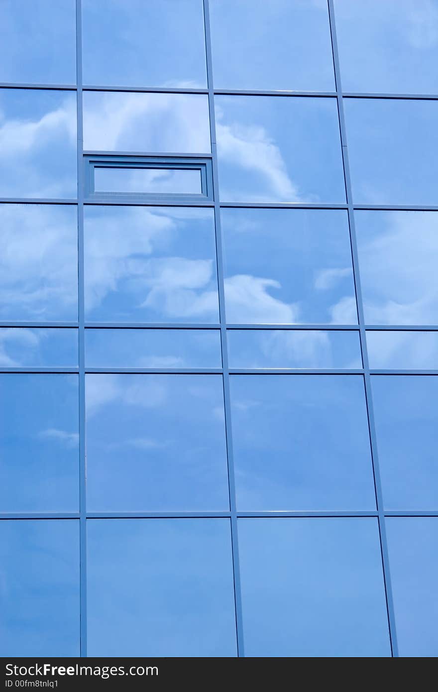 Reflection of the sky in windows of a skyscraper. Reflection of the sky in windows of a skyscraper.