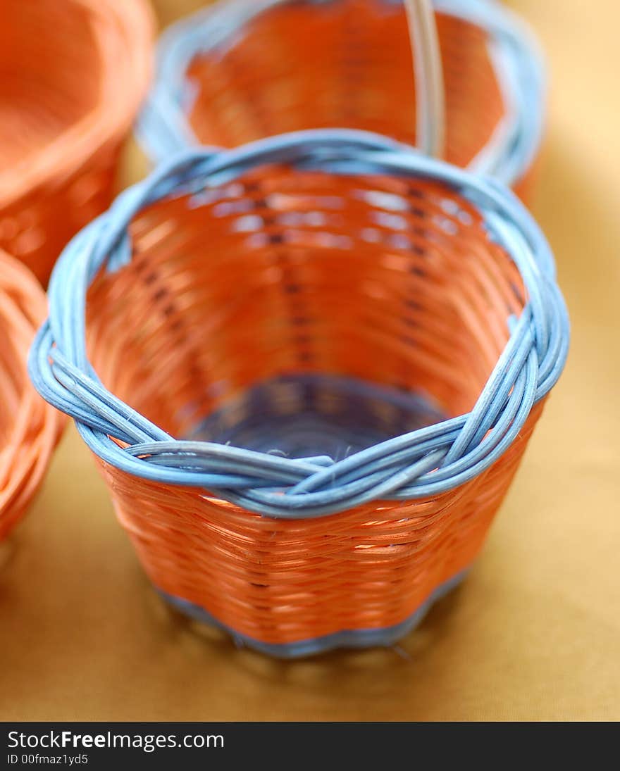 Orange mini basket with blue rim