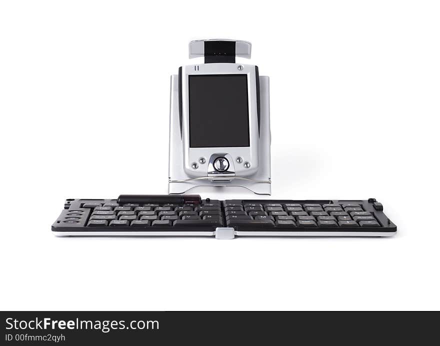 Pocket PC with remote infrared keyboard isolated over white background. Pocket PC with remote infrared keyboard isolated over white background