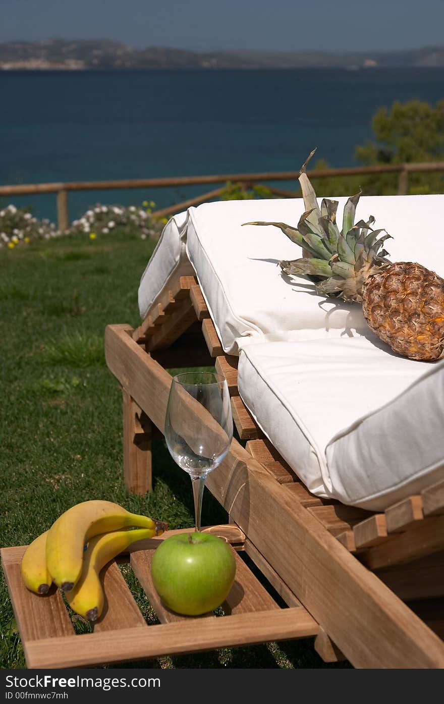 Breakfast is ready and served with fruits and wine ( or you can see it is as afternoon! ) in the area of Lassi in the island of Cephalonia in Greece. Located in the touristic area of Lassi very close to island's capital Argostoli where one of its most famous and popular areas for its beautiful beaches and resort facilities is the area of Lassi. Breakfast is ready and served with fruits and wine ( or you can see it is as afternoon! ) in the area of Lassi in the island of Cephalonia in Greece. Located in the touristic area of Lassi very close to island's capital Argostoli where one of its most famous and popular areas for its beautiful beaches and resort facilities is the area of Lassi.