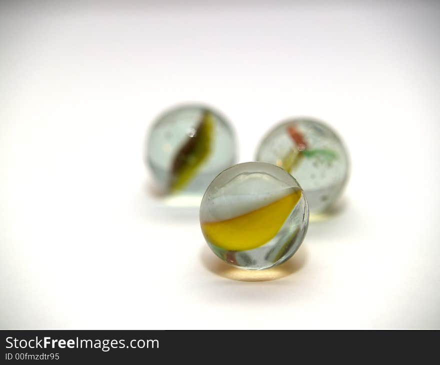 Three glass balls on the white background