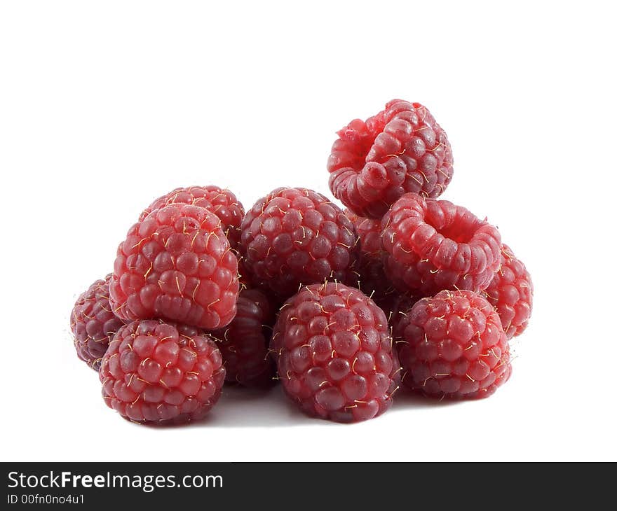 Photo of a bunch of raspberries isolated on a white background