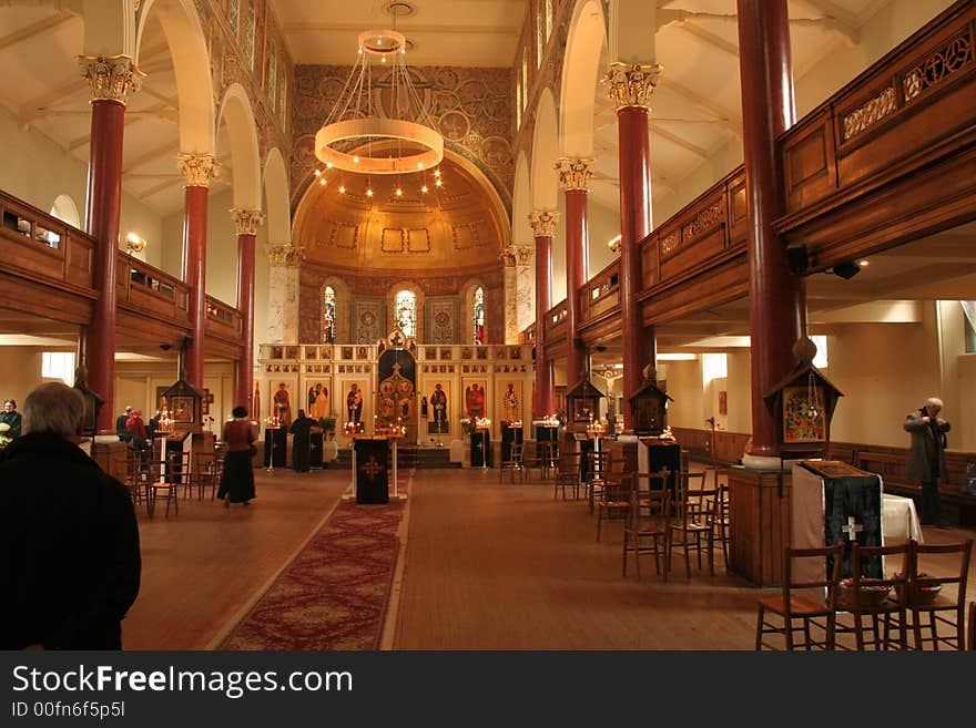 The gold lighted interior of the old orthodox church at the early morning . London. UK. The gold lighted interior of the old orthodox church at the early morning . London. UK.