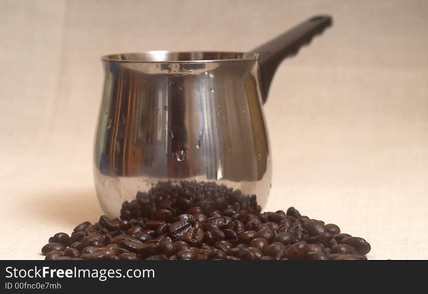 Still life of coffee grains and pieces of service. Still life of coffee grains and pieces of service