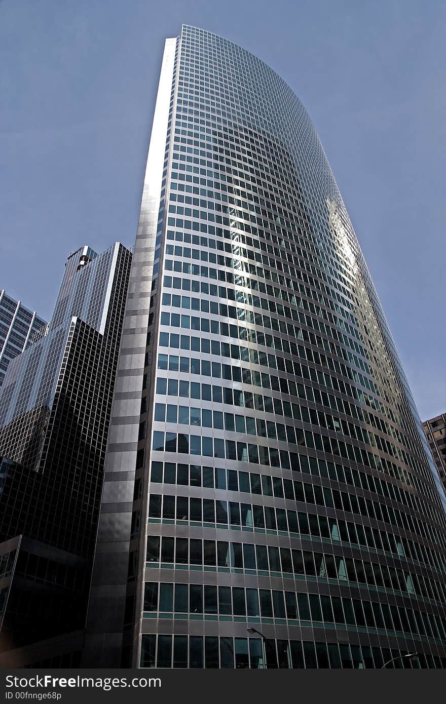 A view looking up at the skyscrapers in the financial district of Chicago, IL.