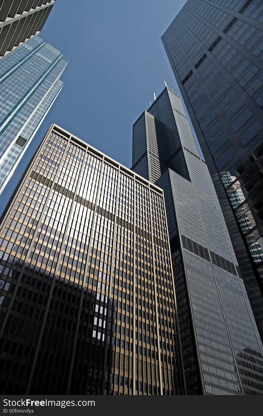 A view looking up at the skyscrapers in the financial district of Chicago, IL.