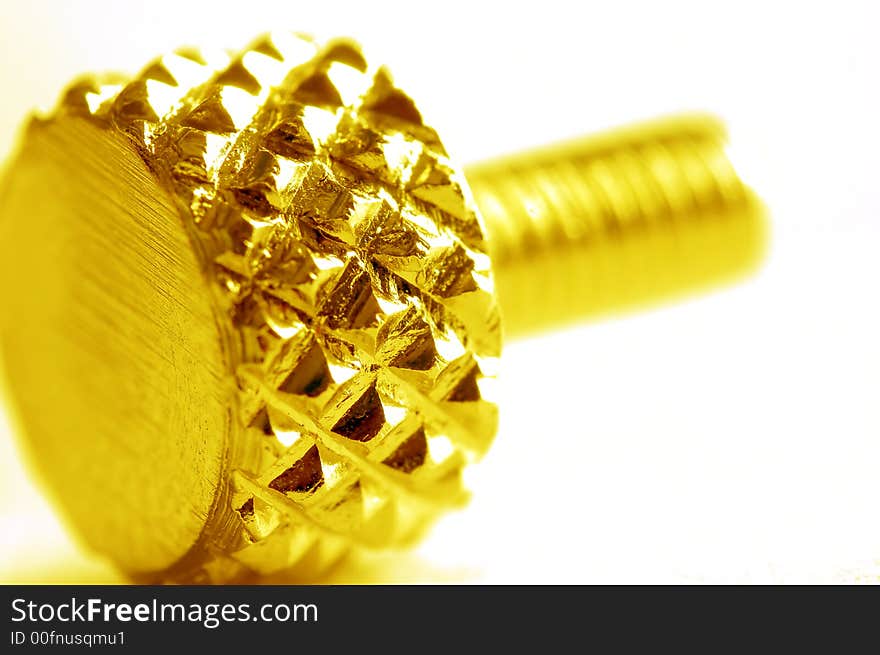 Yellow screw close-up. Conceptual image