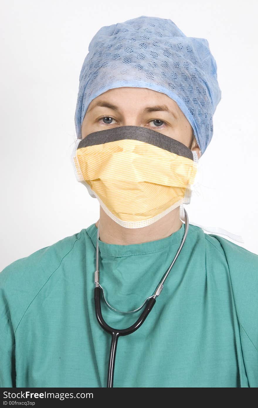 A female surgeon in her sterile surgical clothes