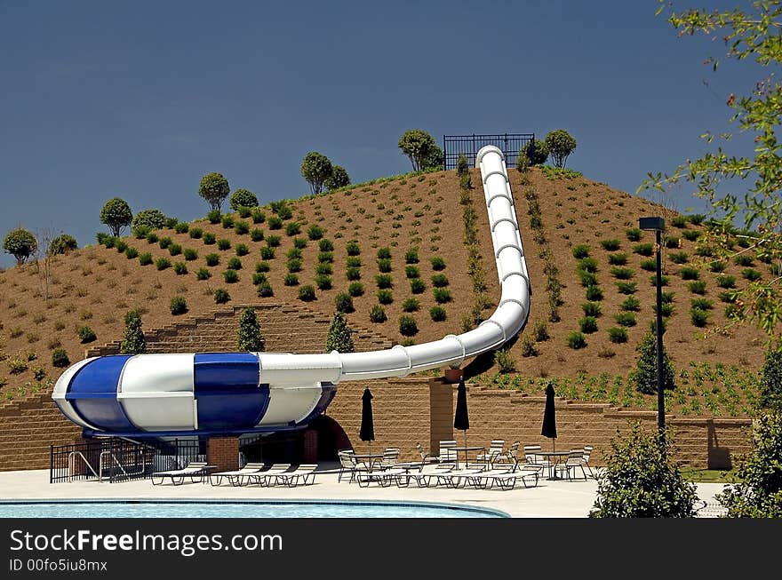 A fully enclosed downhill water slide