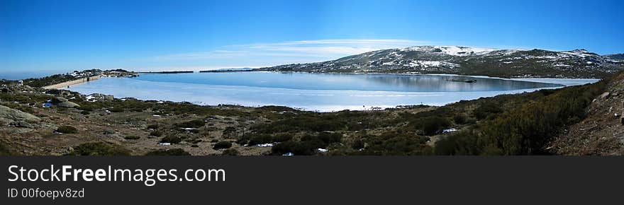 A very cold day on the lagoon above Penhas da Saude, in the Estrela mountain range in Portugal. A very cold day on the lagoon above Penhas da Saude, in the Estrela mountain range in Portugal.