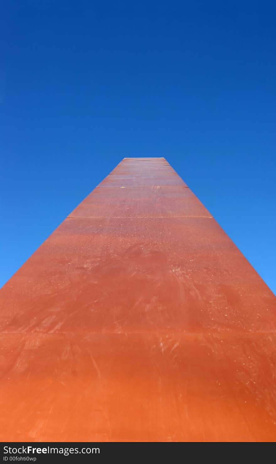 Shot looking up the long arm of a huge sundial on a clear day in Cave Creek, Arizona. Shot looking up the long arm of a huge sundial on a clear day in Cave Creek, Arizona.