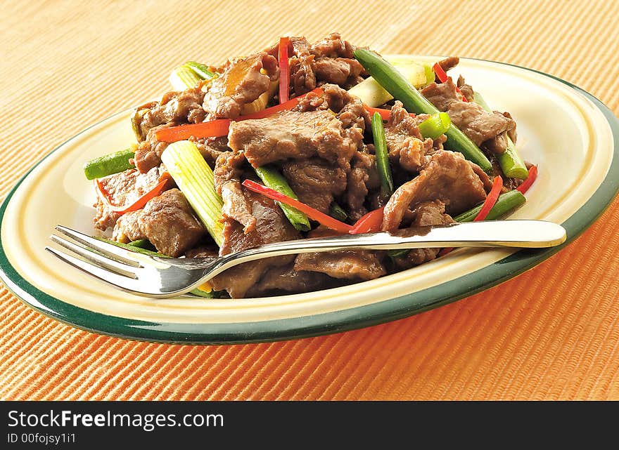 Main course meal of beef with spring onion. Main course meal of beef with spring onion