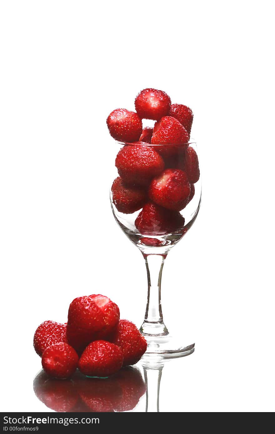 Strawberry in glass on white background. Strawberry in glass on white background