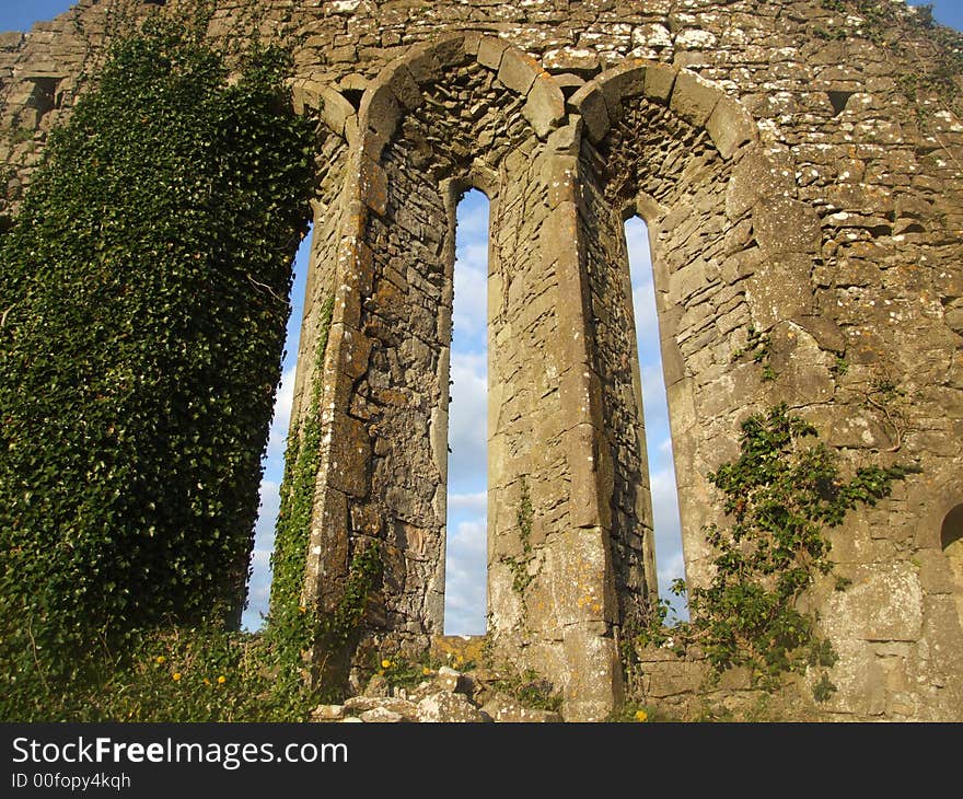 Close up of historic church window in 10th century ruins located in county Clare, Ireland