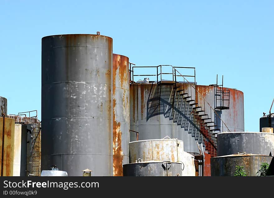 A collection of old rusty tanks and stairs