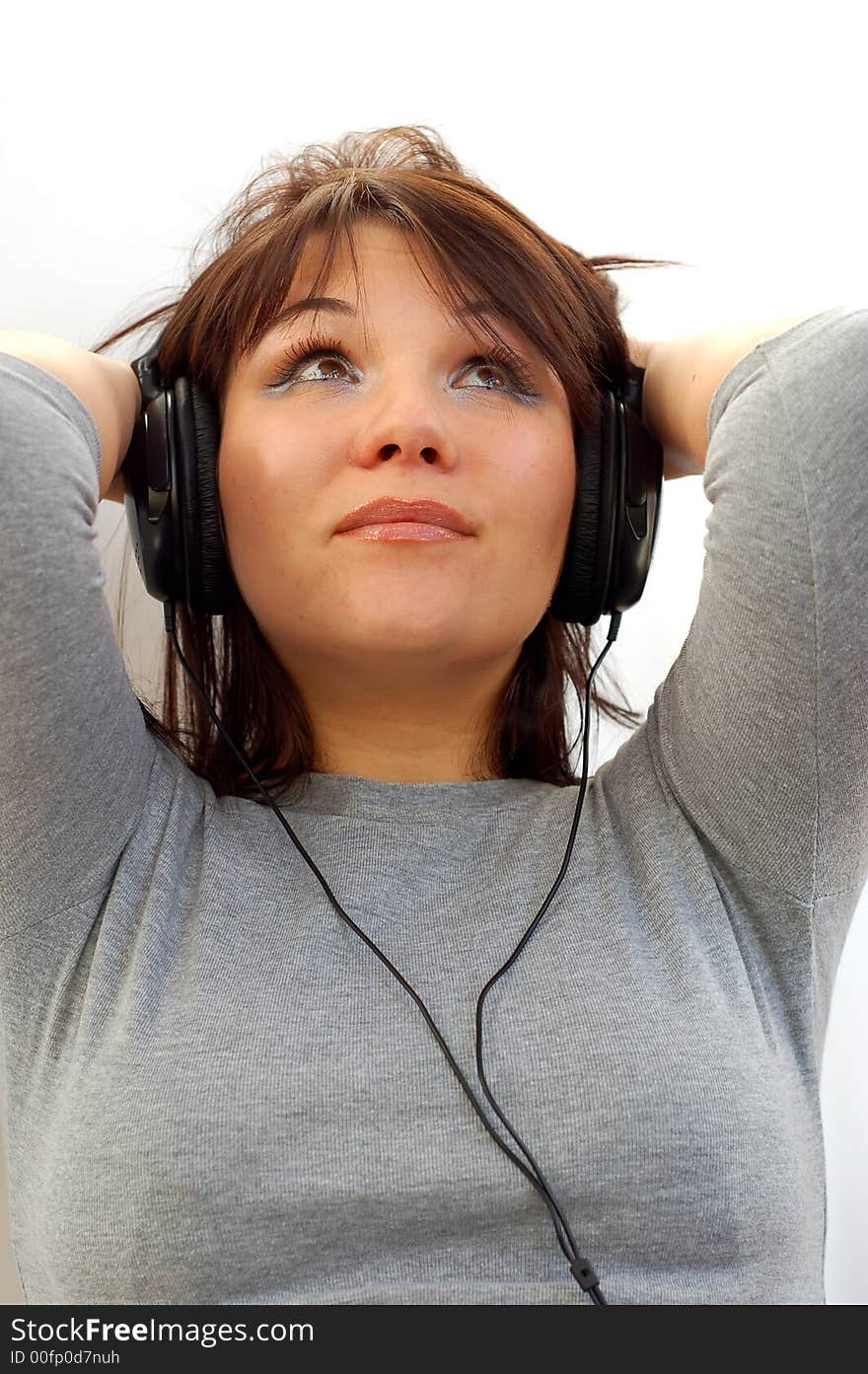 Attractive woman with headphones on white background. Attractive woman with headphones on white background