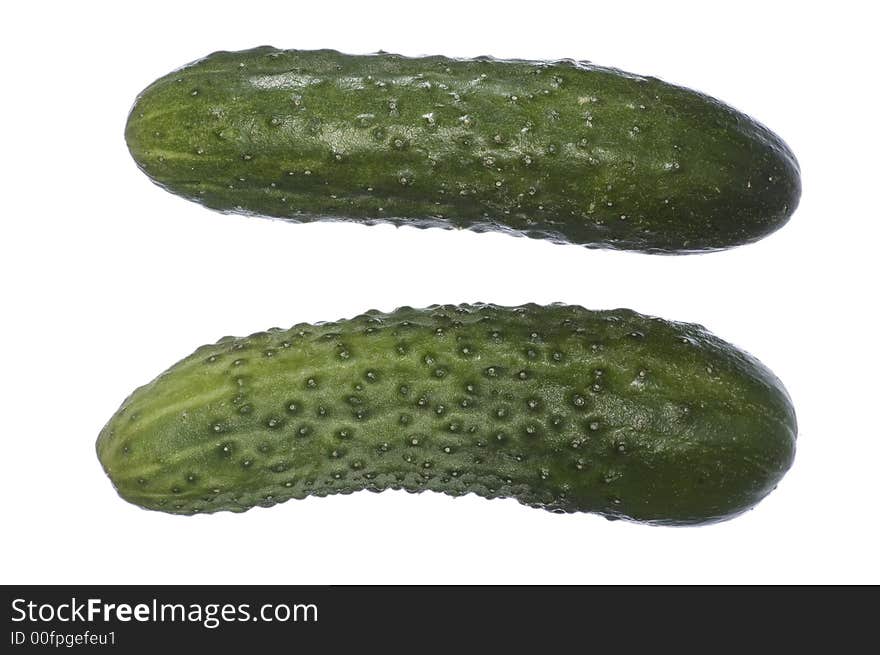 Two green cucumbers on white isolated