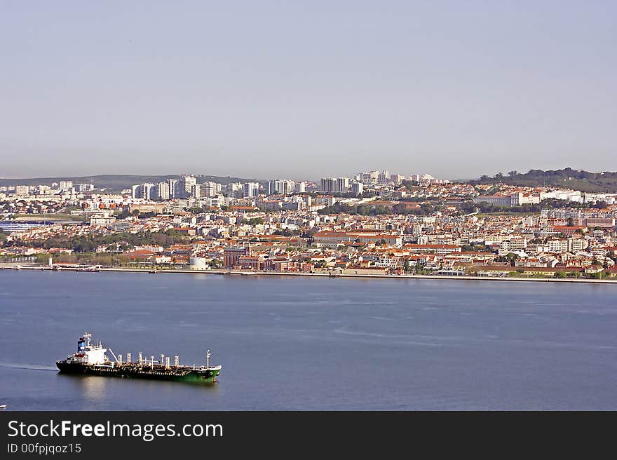 Cargoship On Tagus In Portugal