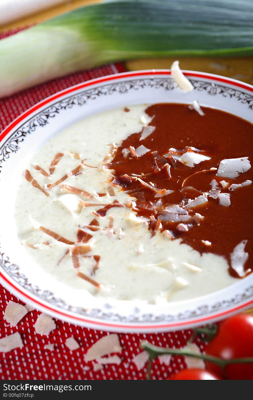 White and red cold soup in the plate