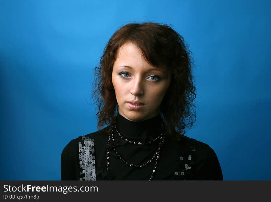 The nice girl on a blue background