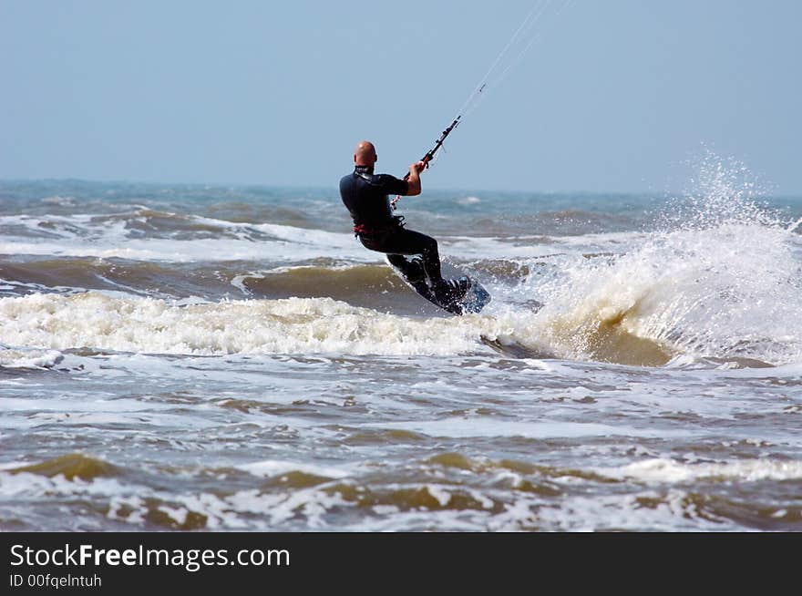 Kite surfing on a windy day