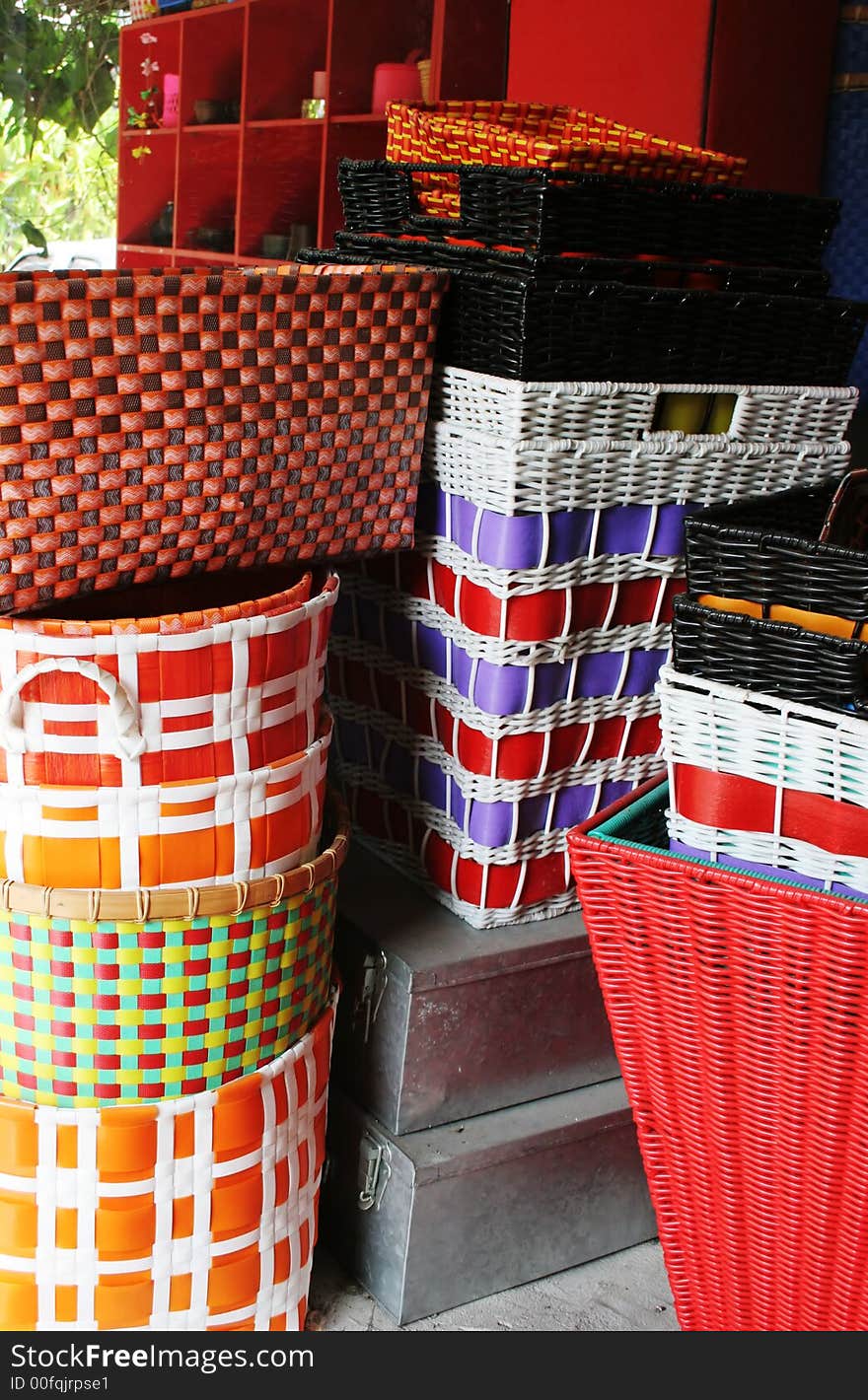 Colorful cane baskets stacked in a pile