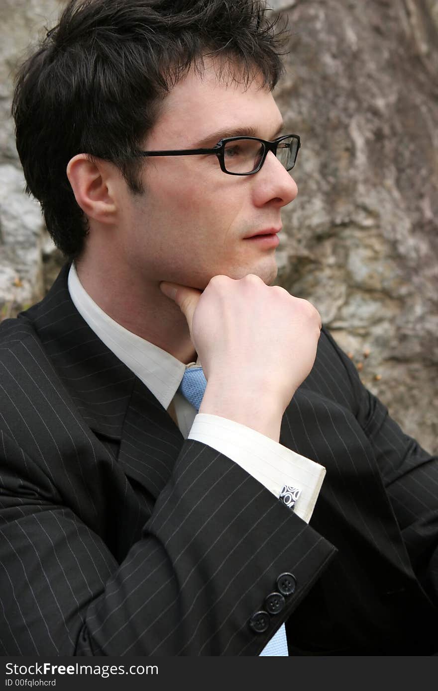 Side profile of a young businessman