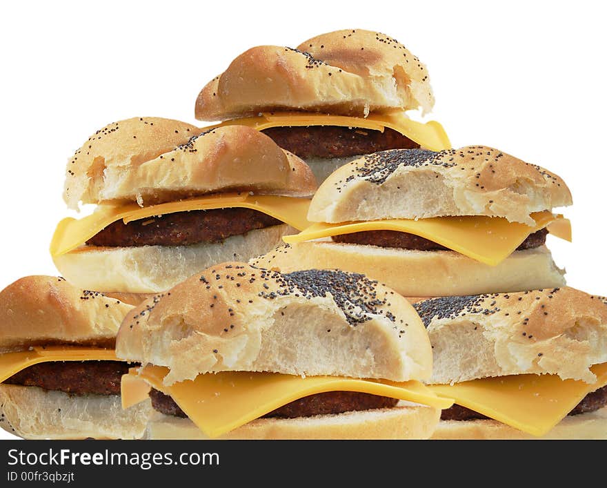 Close-up of six cheeseburgers on crescent rolls, with a clipping path. Close-up of six cheeseburgers on crescent rolls, with a clipping path.