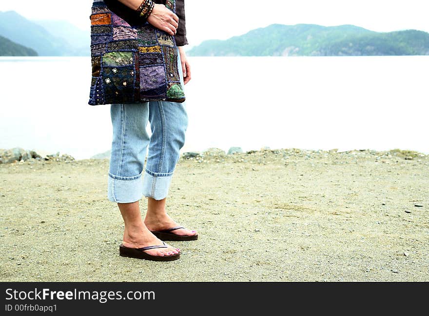 Women strolling along the beach at Harrison Hot Springs, BC. Women strolling along the beach at Harrison Hot Springs, BC