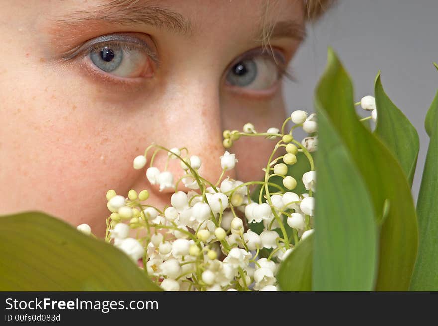 An image of a woman with lily of the vallay