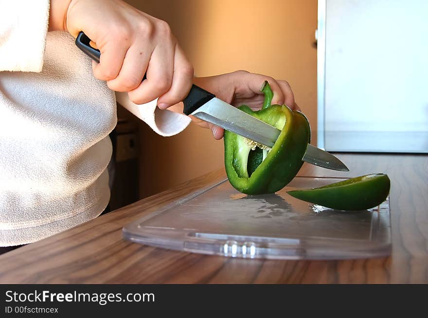 Pepper cutting in a trendy kitchen