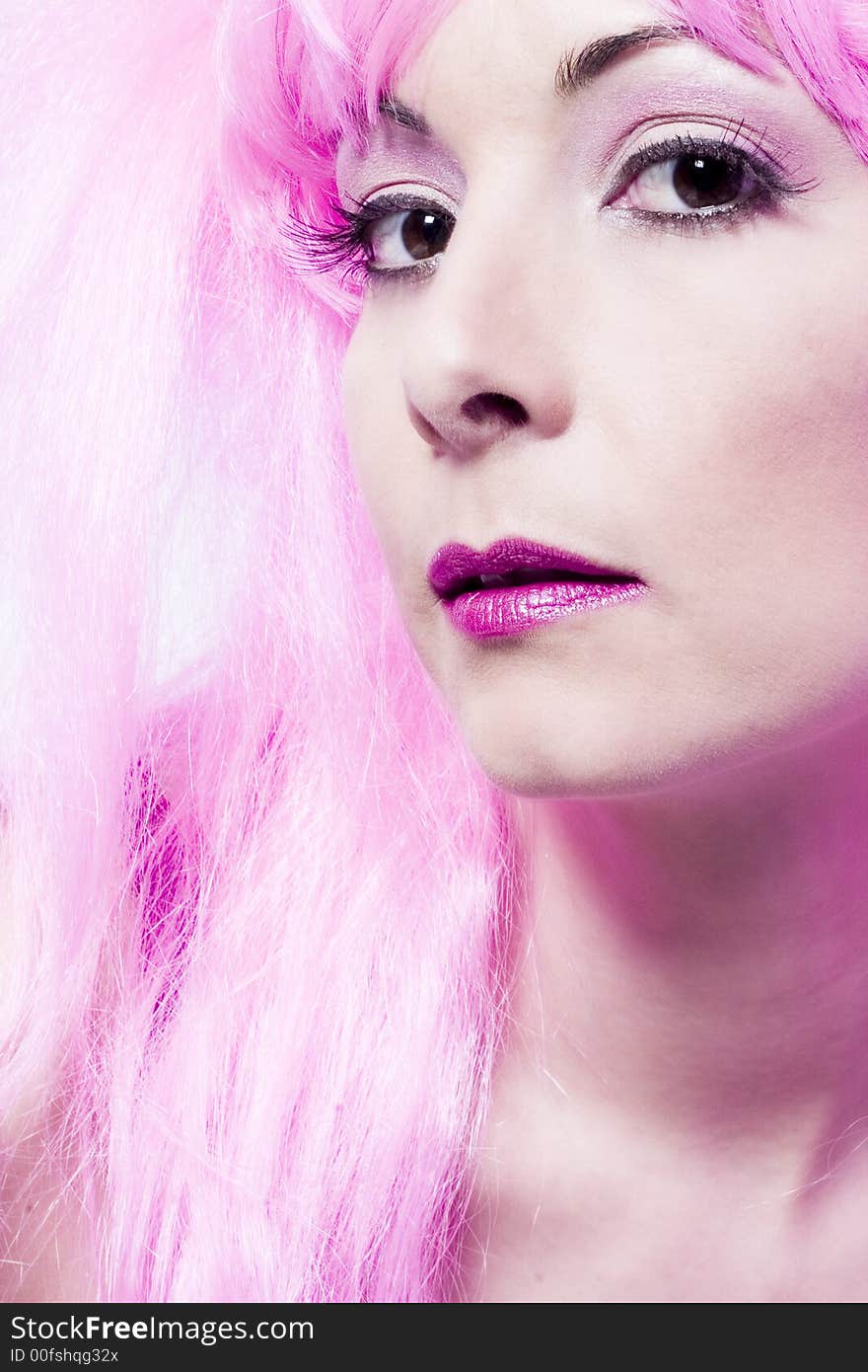 Portrait of a woman in front of a white background in a studio enviroment. Portrait of a woman in front of a white background in a studio enviroment