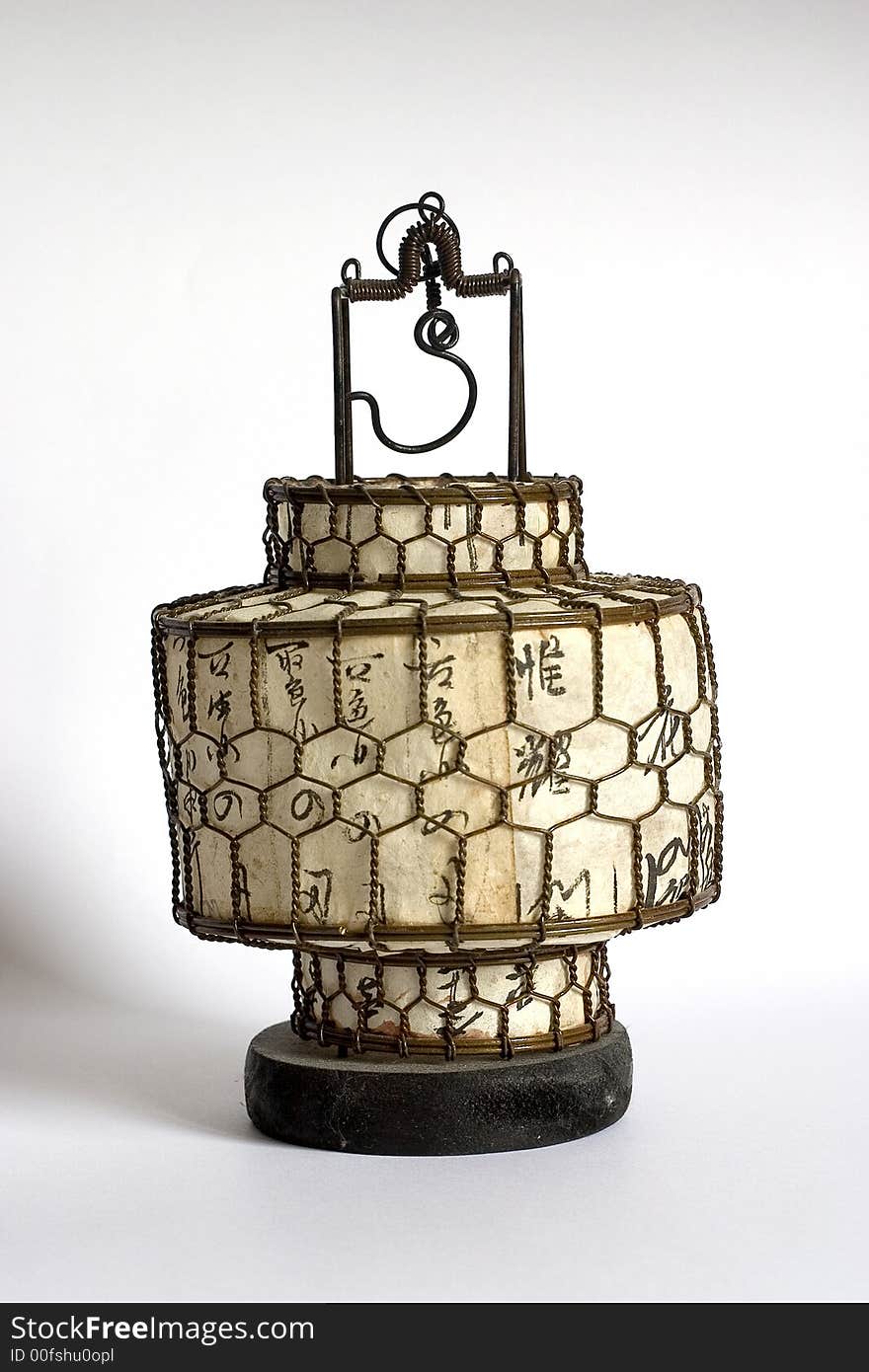 Antique Chinese Lamp. Burnished metal lamp with  characters representing Joy, Peace, Love and Harmony.