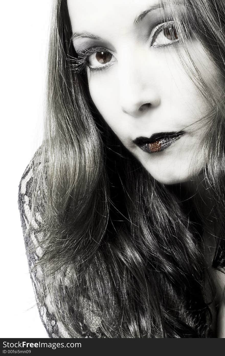 Portrait of a woman in front of a white background in a studio enviroment. Portrait of a woman in front of a white background in a studio enviroment