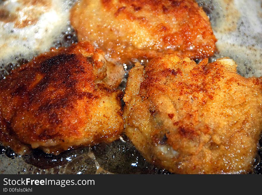 Delicious Frying meat in oil