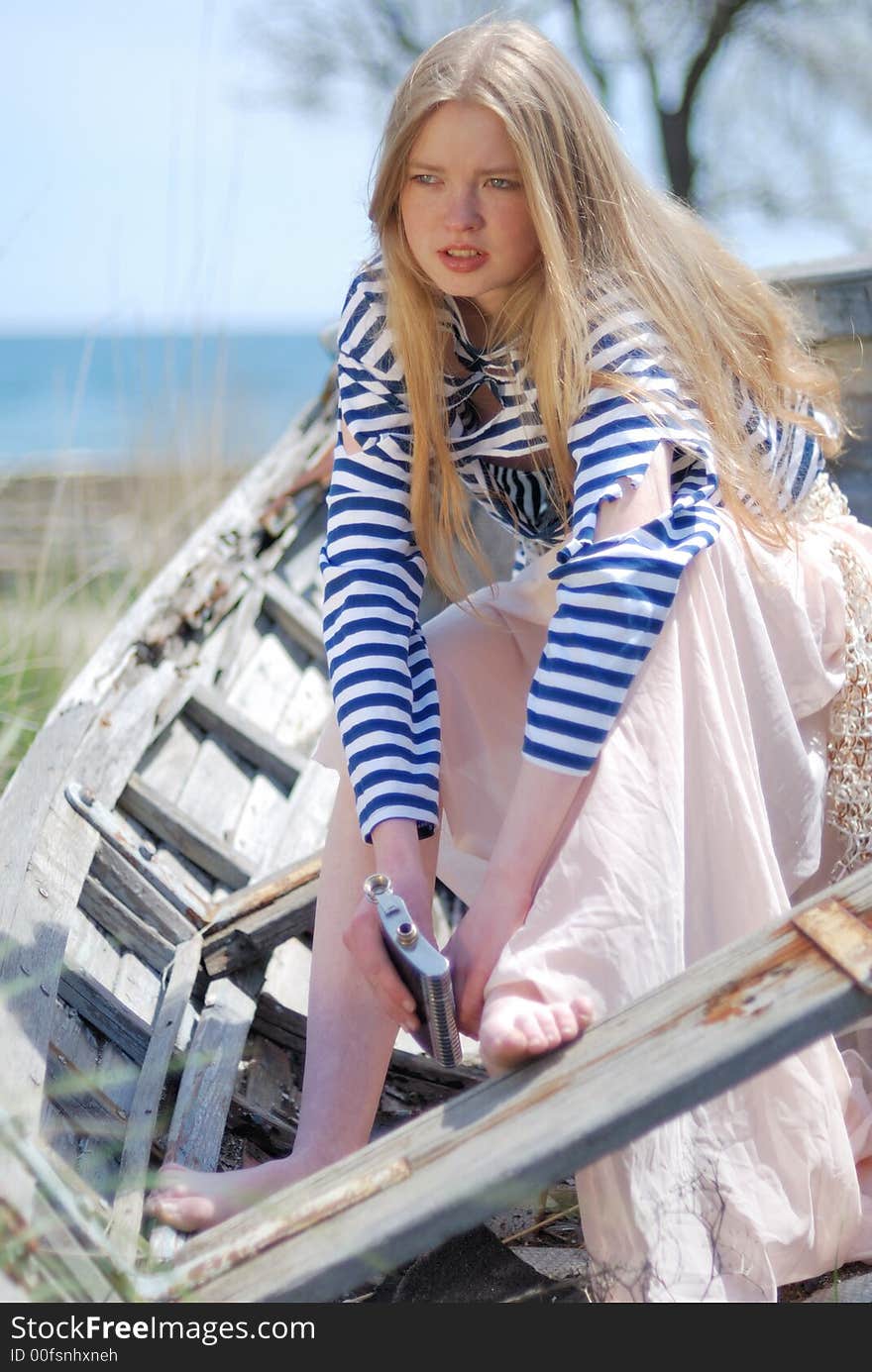 Blond sitting in the Boat (Ukraine, Crimea). Blond sitting in the Boat (Ukraine, Crimea)