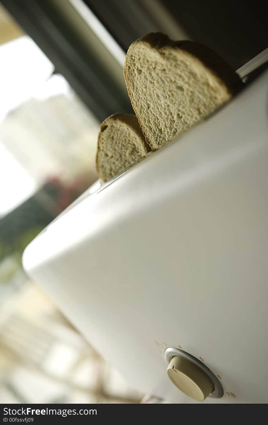 Toaster Close-up with two pieces of bread