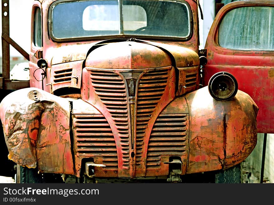 Old rusted red delivery truck. Old rusted red delivery truck