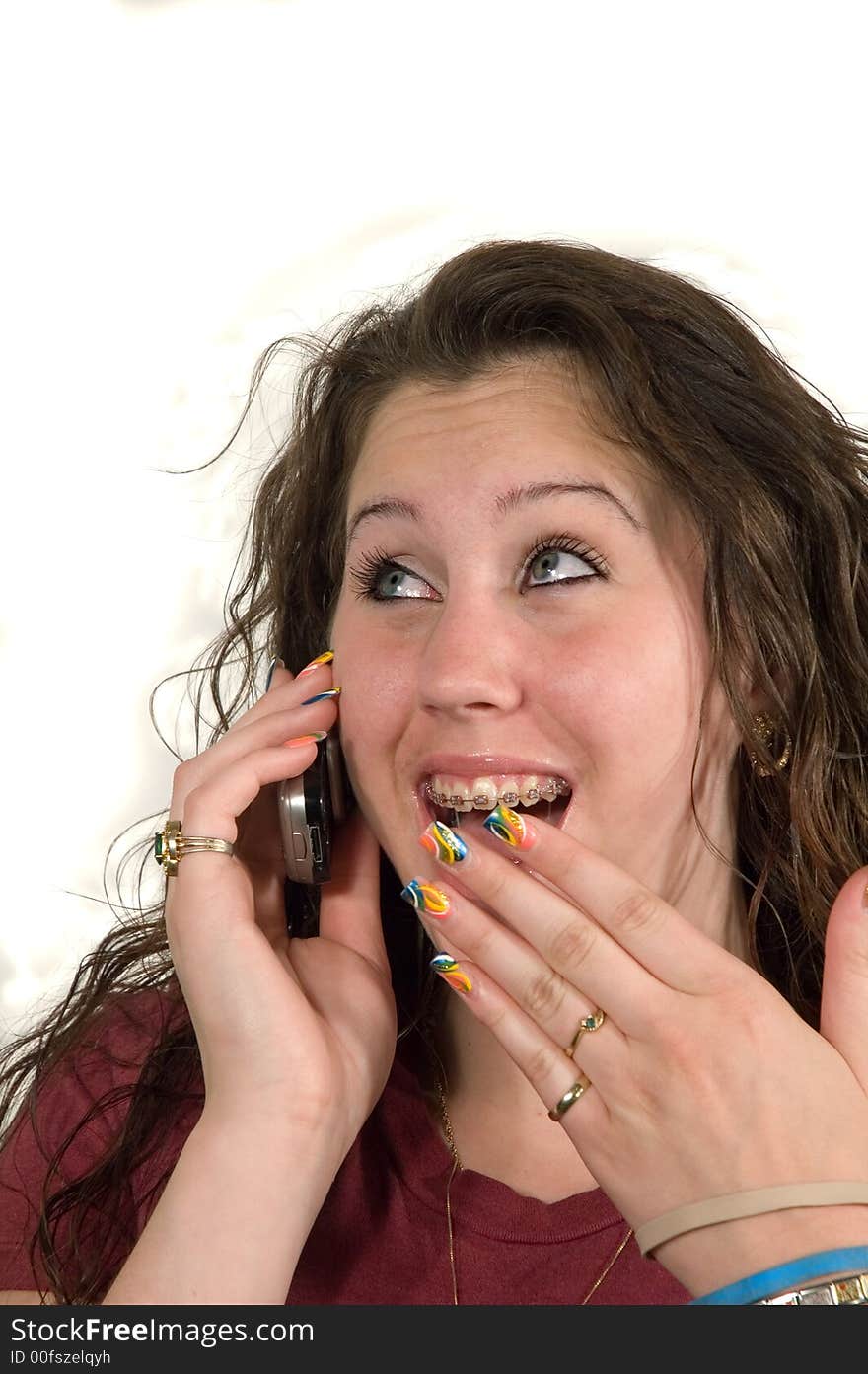 Caucasian Teenage girl on cell phone and isolated. Caucasian Teenage girl on cell phone and isolated