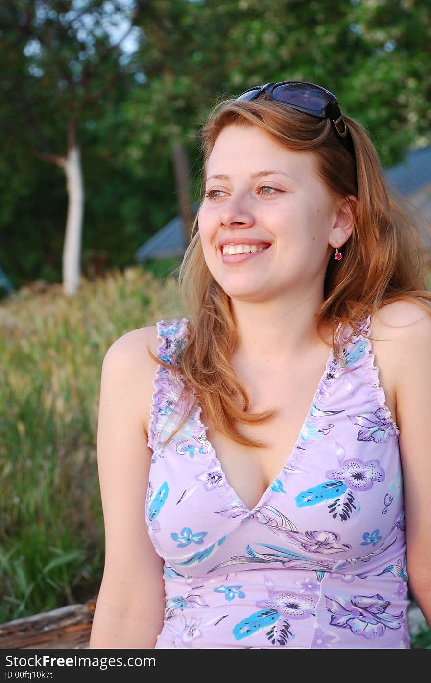 Smiling girl on sunset light