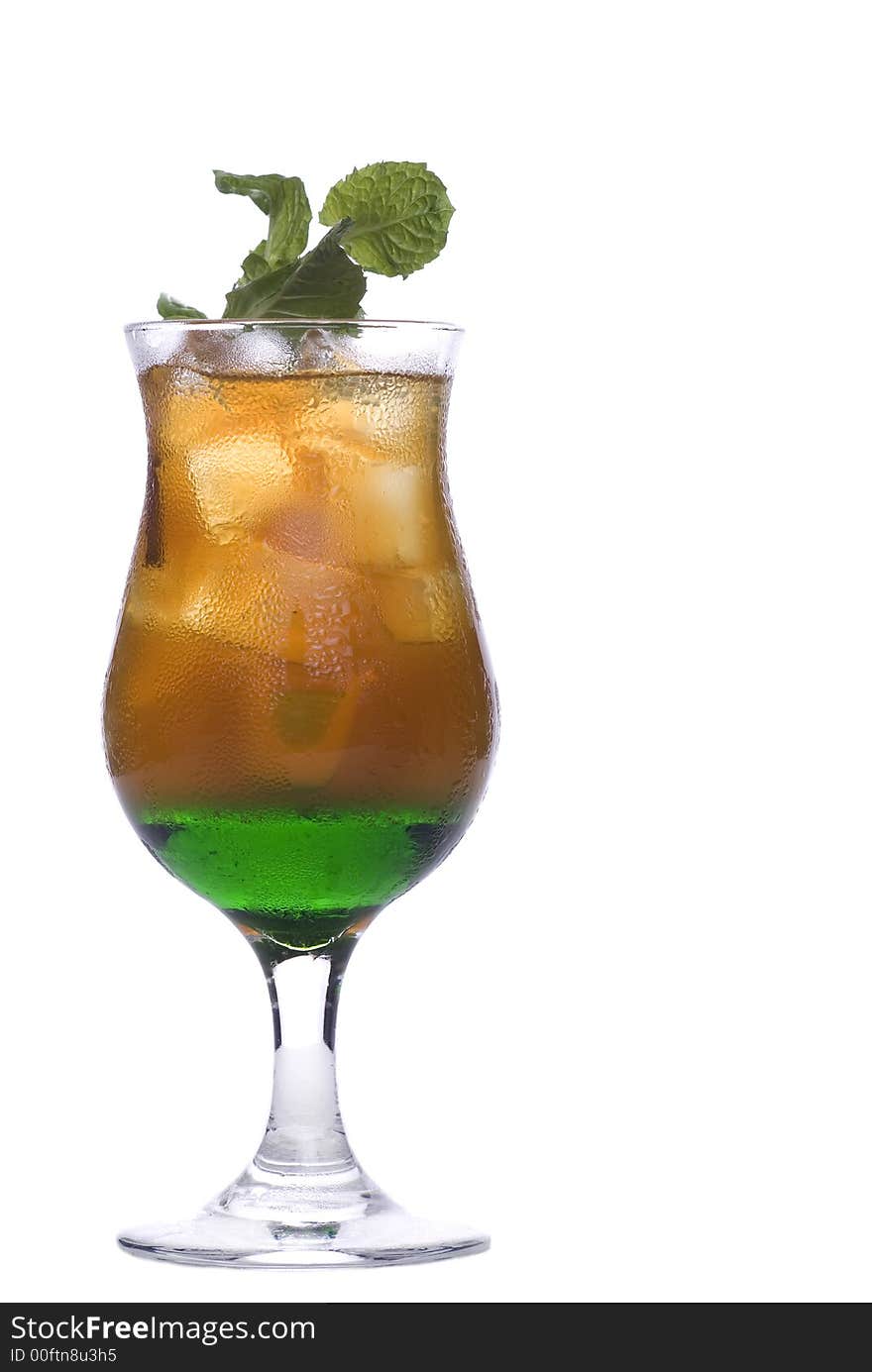 Colorful alcoholic cocktail in a glass against white background. Colorful alcoholic cocktail in a glass against white background