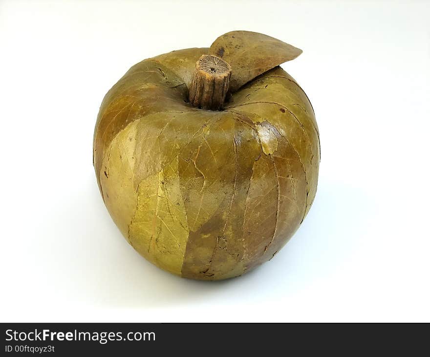 Decorative apple made of dried leafs and wood, handmade. Decorative apple made of dried leafs and wood, handmade