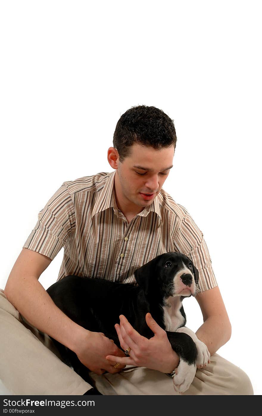 Young man looks at his dog