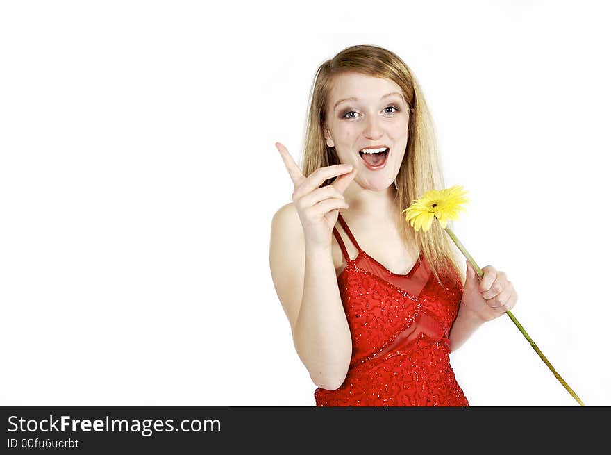 Attractive blond picking petals from a daisy. Attractive blond picking petals from a daisy