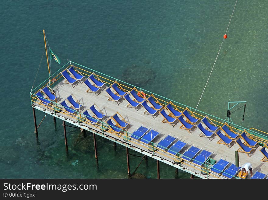 Empty deckchairs on the beach